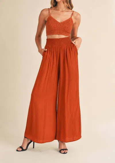 Mable Smocked Bralette Crop Top & Wide Leg Pants Set In Rust In Multi