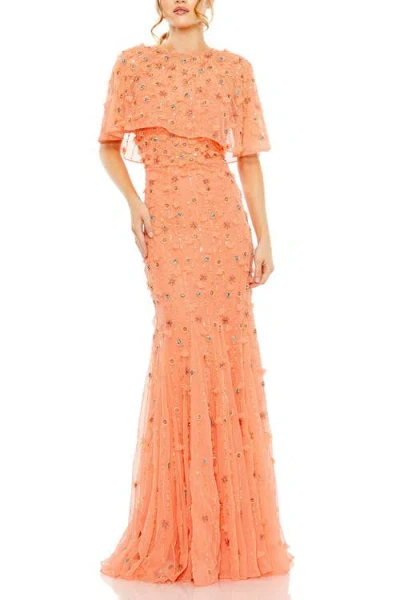 Mac Duggal Embellished Illusion Cape Sleeve Trumpet Gown In Coral