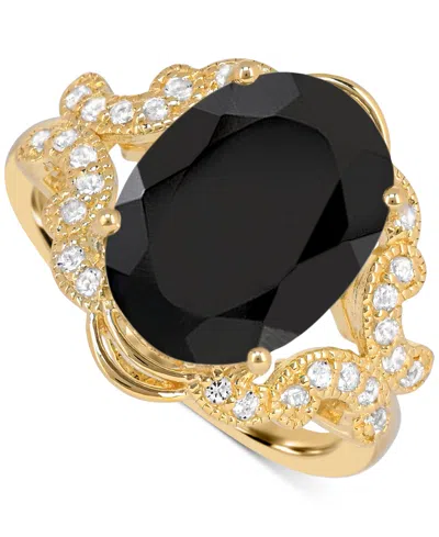 Macy's Blue Topaz (7 Ct. T.w) Oval Ring In 14k Gold Plated Sterling Silver In Black