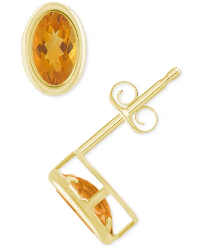 Macy's Created Sapphire Oval Stud Earrings (1-1/2 Ct. T.w.) In 10k Yellow Gold In Citrine,gold