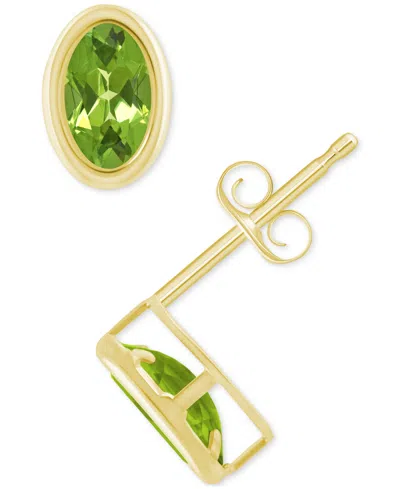 Macy's Created Sapphire Oval Stud Earrings (1-1/2 Ct. T.w.) In 10k Yellow Gold In Peridot,gold