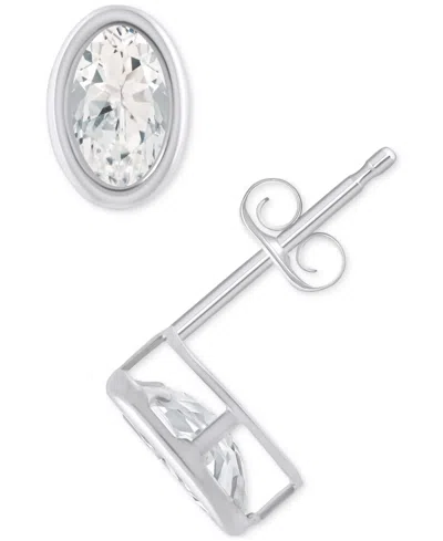 Macy's Created Sapphire Oval Stud Earrings (1-1/2 Ct. T.w.) In 10k Yellow Gold In White Topaz,white Gold