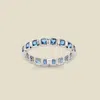 Made By Mary Cubic Zirconia Eternity Birthstone Ring In Blue