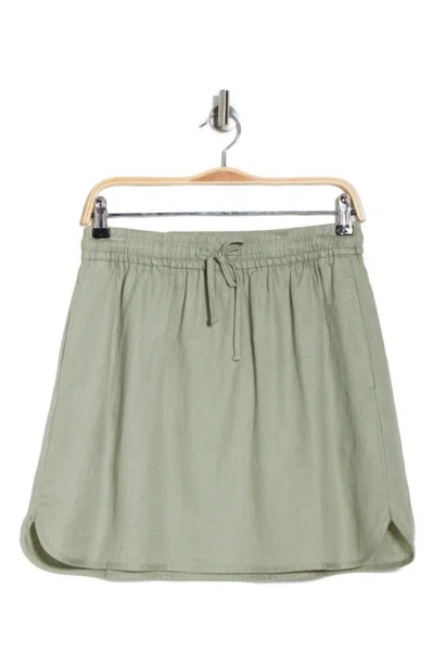 Madewell Curved Hem Linen-blend Miniskirt In Green