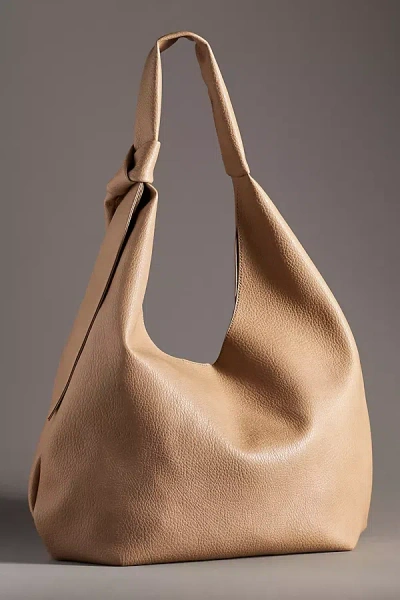 Maeve Knotted Bow Slouchy Bag In Beige