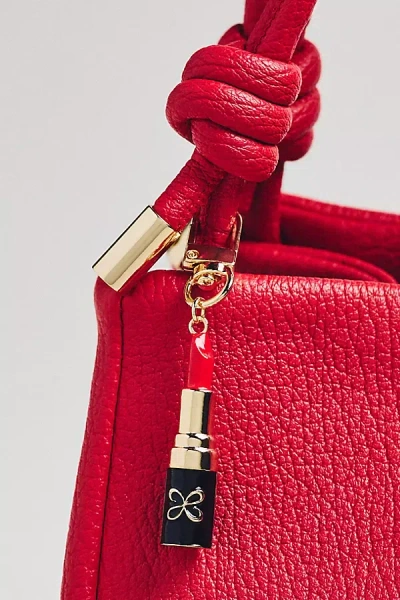 Maeve Lipstick-shaped Metal Bag Charm In Gold