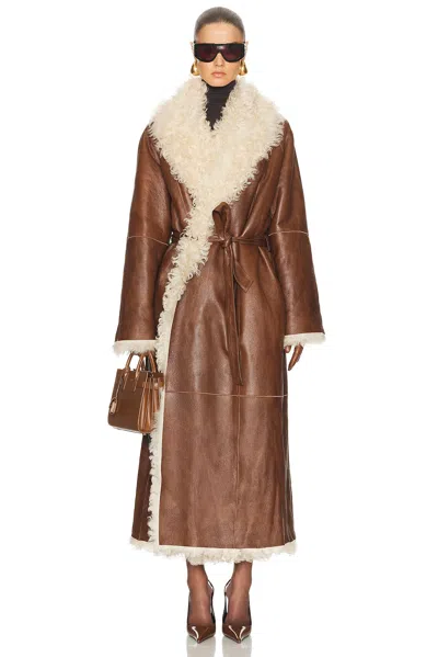 Magda Butrym Long Belted Shearling Reversible Coat In Brown