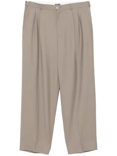 Magliano Pleat Detailed Tapered-leg Trousers In Neutral