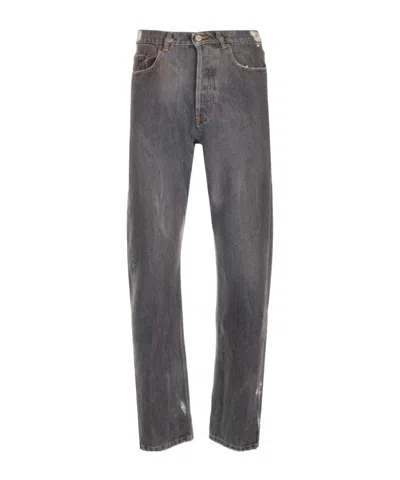 Magliano Unregular Logo Patch Jeans In Black