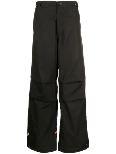 Maharishi Graphic-print Straight-leg Trousers In Black