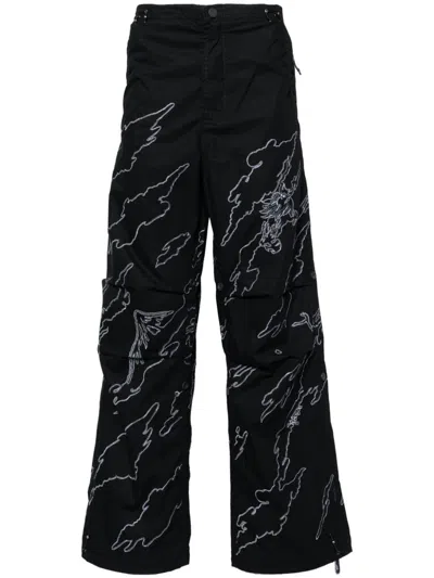 Maharishi Maha Basquiat Trousers In Black