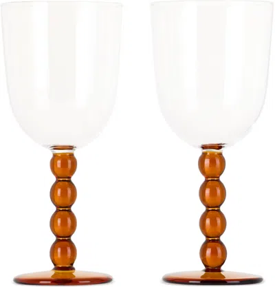 Maison Balzac Red Volute Wine Glass Set In Clear/amber