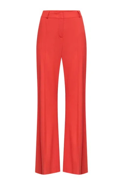 Maison Common Bootleg Trousers In Cool Wool In Red