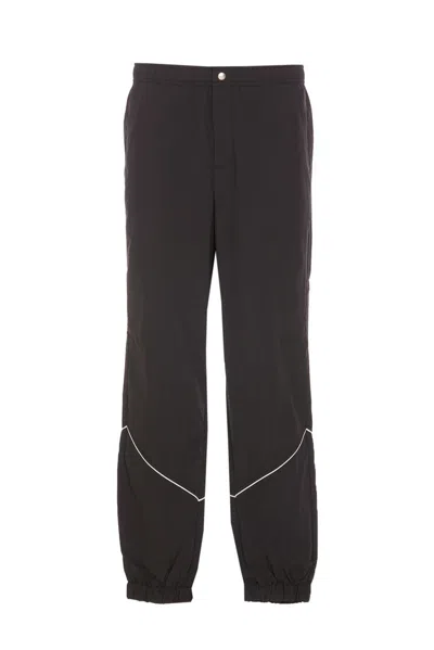 Maison Kitsuné Track Pants With Button Detail And Pockets In Black