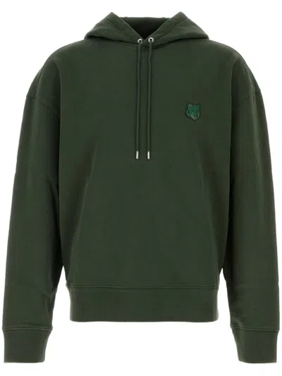 Maison Kitsuné Cropped Deep Green Hoodie With Subtle Emblem And Relaxed Fit