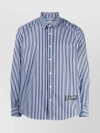 MAISON KITSUNÉ STRIPED SHIRT WITH CURVED HEM AND FLORAL EMBROIDERY