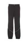 Maison Kitsuné Track Pants With Button Detail And Pockets In Black