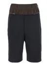 Maison Margiela Black Shorts With Layered Design And Side Button Closure
