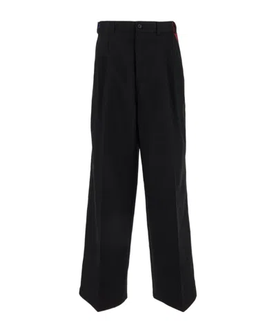 Maison Margiela Checkered Panelled Trousers In Black