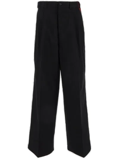 Maison Margiela Checkered Panelled Trousers In Black