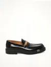 Maison Margiela Sophisticated Loafers For Men In Black