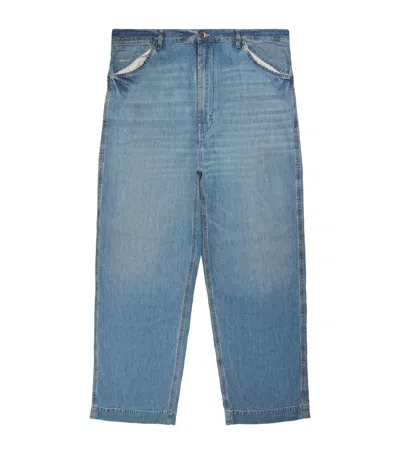 Maison Margiela Distressed Wide-leg Jeans In Blue
