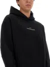 Maison Margiela Minimalist Black Hoodie With Upside-down Logo In Black
