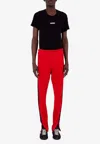 Maison Margiela Four Stitch Logo Skinny Track Pants In Red