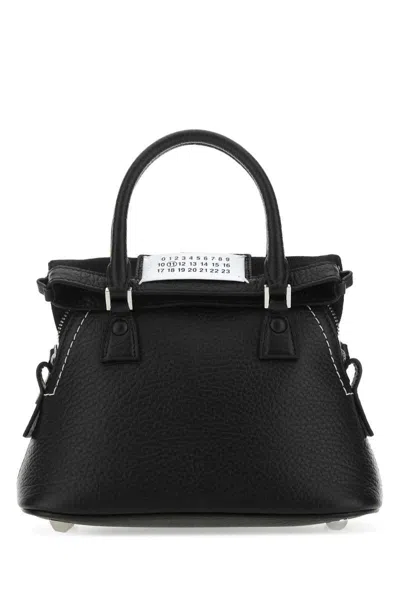 Maison Margiela Handbags. In Black