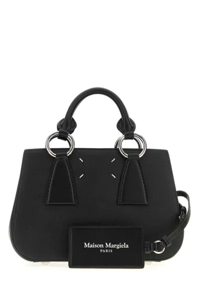 Maison Margiela Handbags. In Black
