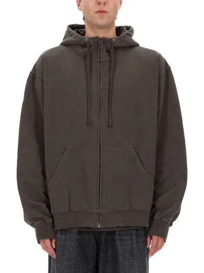 Maison Margiela Oversized Printed Text Cotton Full-zip Hoodie In Brown