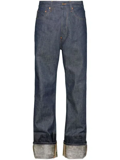 Maison Margiela Lacquered Turn-up Jeans In Blue