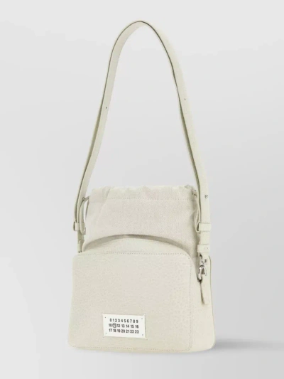 MAISON MARGIELA LEATHER AND FABRIC BUCKET BAG WITH ADJUSTABLE STRAP