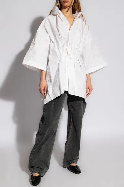 MAISON MARGIELA MAISON MARGIELA LOOSE-FITTING JEANS