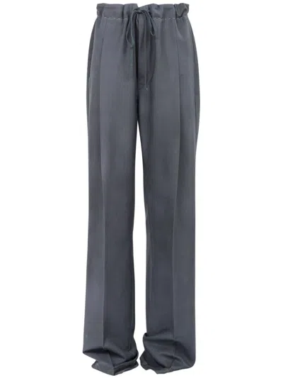 MAISON MARGIELA MAISON MARGIELA MAISON MARGIELA DRAWSTRING PANTS IN MOHAIR WOOL.
CHARCOAL GRAY COLOR WITH HAND-APPLI