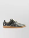 Maison Margiela Replica Sneakers Made Of Shiny Coated Leather In Black