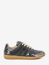 Maison Margiela Replica Sneakers Made Of Shiny Coated Leather In Black
