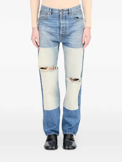Maison Margiela Ripped Patchwork Jeans In Blue