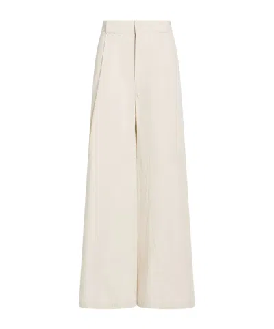 Maison Margiela Solid Color Flared Trousers In Brown