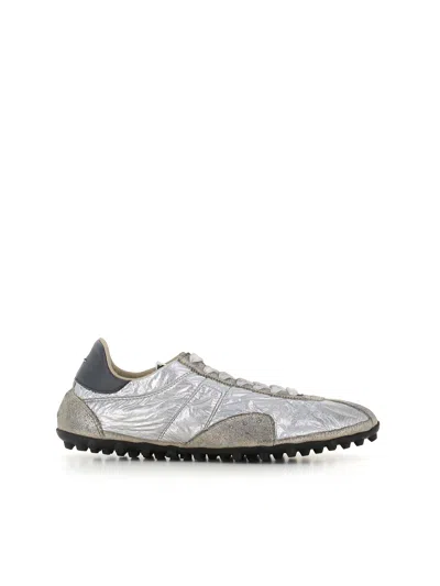 MAISON MARGIELA MAISON MARGIELA SPORTS SHOES WITH A METALLIC FINISH