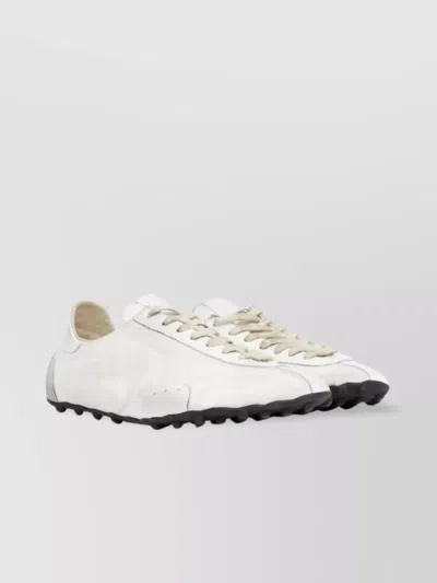 MAISON MARGIELA VINTAGE TREATMENT SUEDE PANEL LOW-TOP SNEAKERS