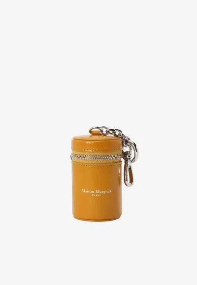 Maison Margiela Zipped Dog Waste Bag Dispenser Keyring In Yellow