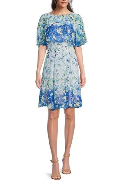 Maison Tara Floral Print Short Sleeve Cape Fit & Flare Dress In Blue Green In Multi