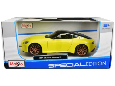 Maisto 2023 Nissan Z Yellow Metallic With Black Top "special Edition" Series 1/24 Diecast Model Car By Mais