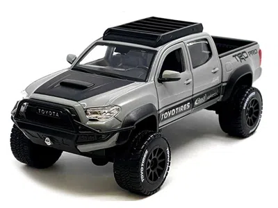 Maisto 2023 Toyota Tacoma Trd Pro Off Road Pickup Truck Cement Gray With Black Hood And Roofrack " De