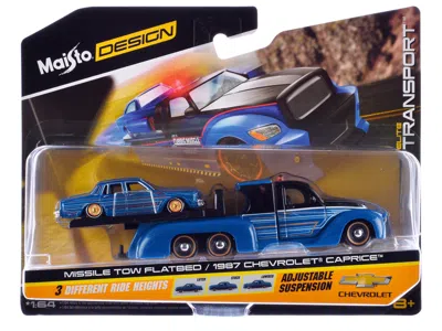 Maisto Missile Tow Flatbed Truck Blue Metallic And Black With Graphics And 1987 Chevrolet Caprice Lowrider 