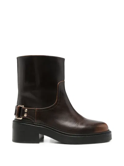 Maje Buckled Leather Ankle Boots In Brown