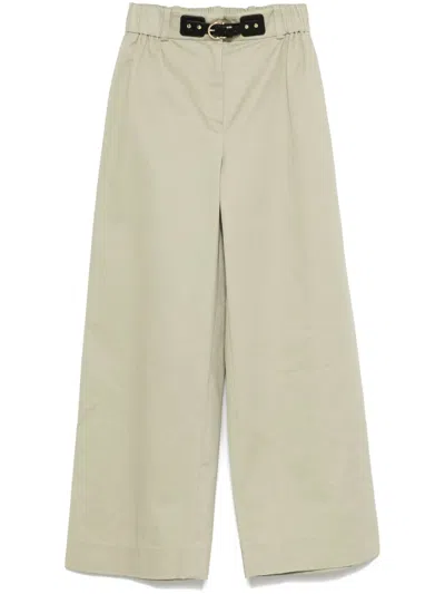 Maje Embossed-logo Trousers In Green