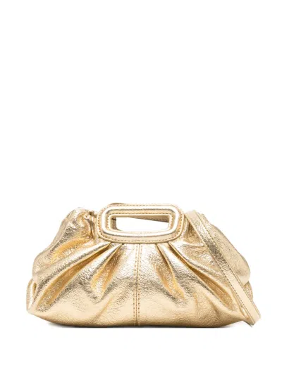 Maje Mini Ruched Leather Clutch Bag In Gold