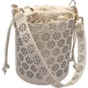 Maje Perforated Leather Bucket Bag In Ecru